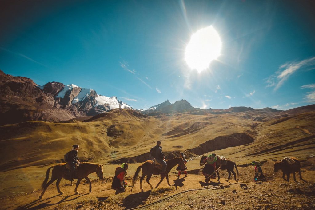 Horses along the trail to Rainbow Mountain